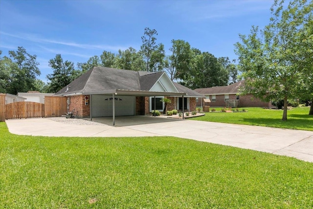 single story home with a garage and a front lawn