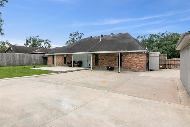 rear view of house with a patio