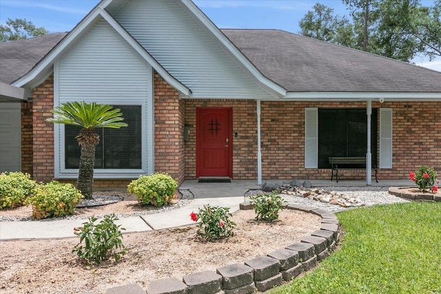 view of front of property featuring covered porch