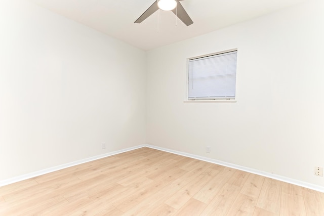 spare room with ceiling fan and light hardwood / wood-style flooring