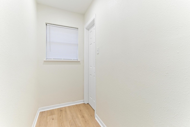 corridor featuring light wood-type flooring