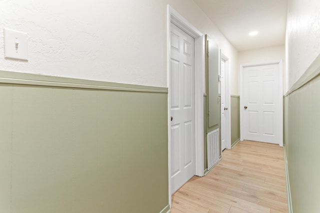 hall featuring light hardwood / wood-style flooring