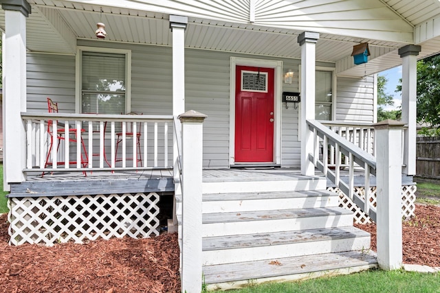 entrance to property with covered porch