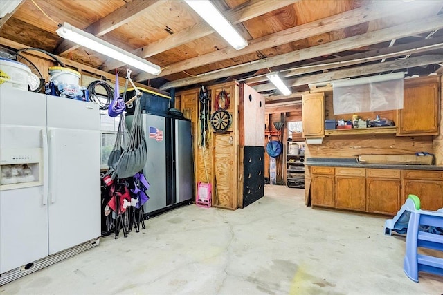 3821 Suncrest Dr, Groves, TX 77619 - basement with white fridge with ice dispenser