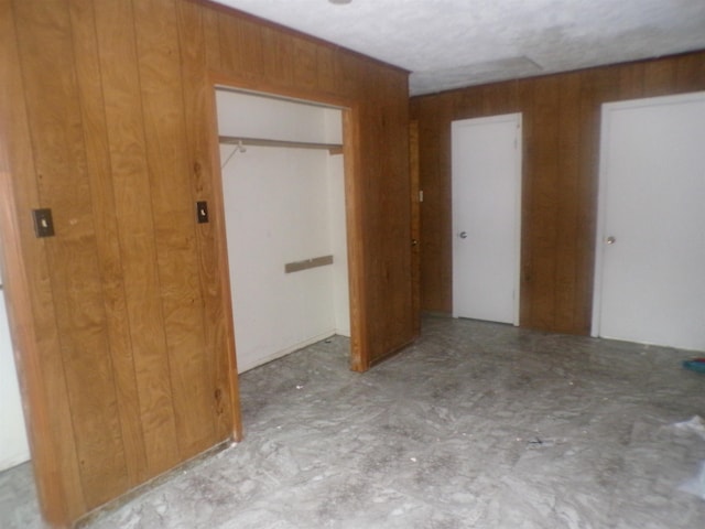 468 Garland Ave, Beaumont, TX 77705 - unfurnished bedroom featuring wooden walls