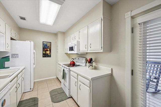1006 Park Meadow Dr, Beaumont, TX 77706 - kitchen with white appliances, healthy amount of natural light, and white cabinetry