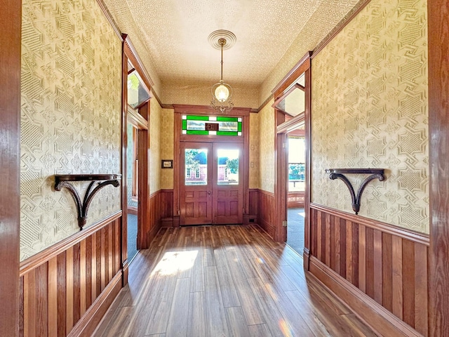 interior space featuring french doors and hardwood / wood-style flooring