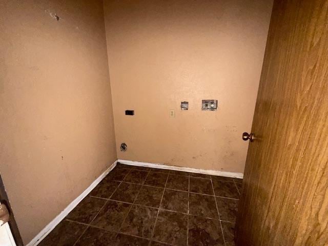 290 Rosine St, Beaumont, TX 77707 - washroom with washer hookup, dark tile patterned floors, and electric dryer hookup