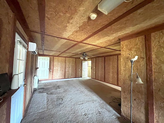 miscellaneous room featuring an AC wall unit and ceiling fan