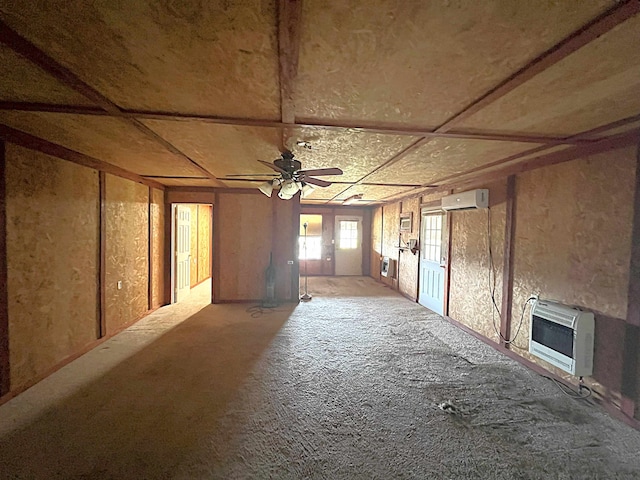 miscellaneous room with a wall mounted air conditioner, carpet, heating unit, and ceiling fan