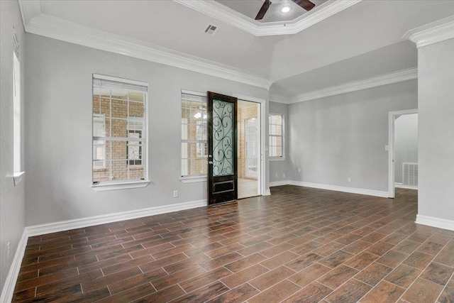 spare room featuring ceiling fan and ornamental molding