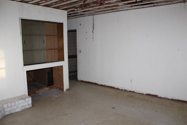 basement featuring tile patterned floors