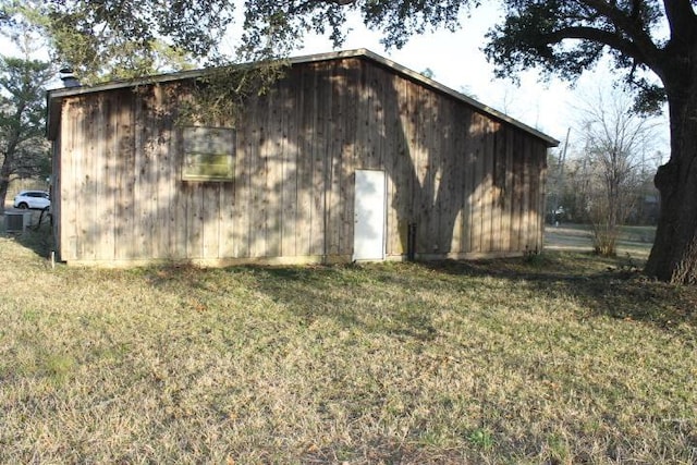 view of home's exterior featuring a yard