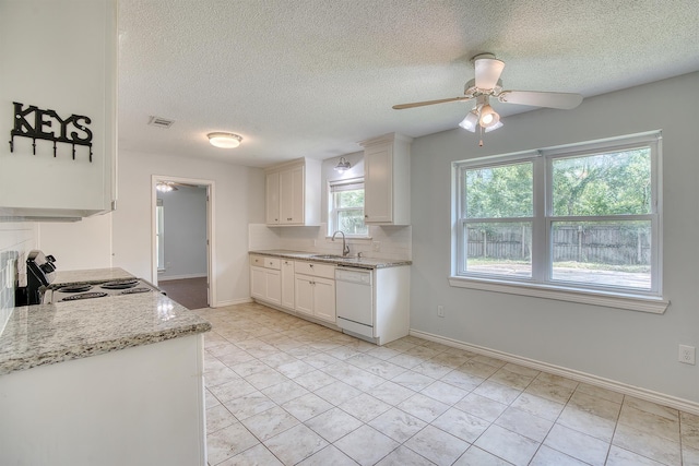 246 Pinevale Way, Sour Lake, TX 77659 - kitchen featuring dishwasher, electric range, ceiling fan, a textured ceiling, and tasteful backsplash