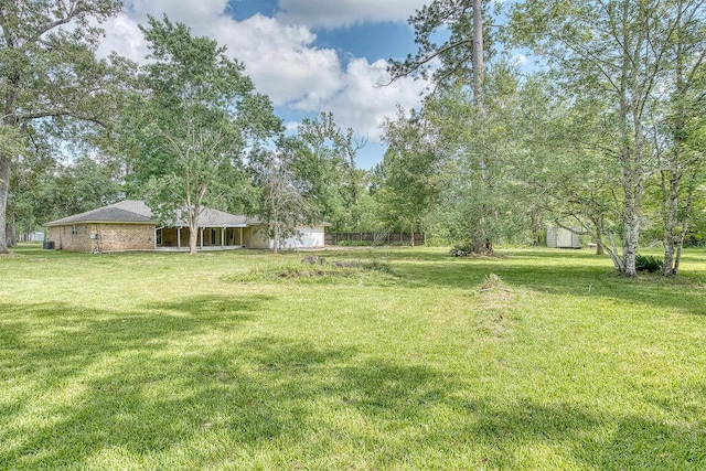 246 Pinevale Way, Sour Lake, TX 77659 - view of grassy yard