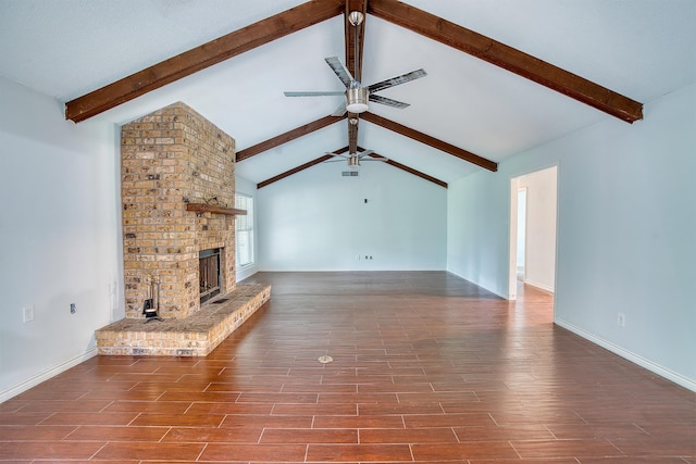 246 Pinevale Way, Sour Lake, TX 77659 - unfurnished living room featuring a ceiling fan, wood finished floors, a fireplace, and baseboards
