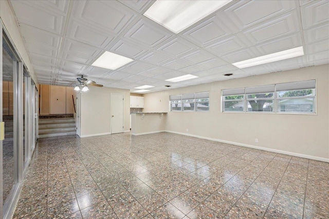 2701 Mcbride Dr, Port Neches, TX 77651 - spare room with a ceiling fan and stairs