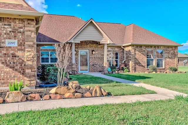 view of front of home with a front lawn