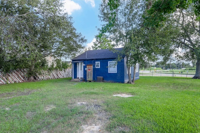 view of yard featuring central AC