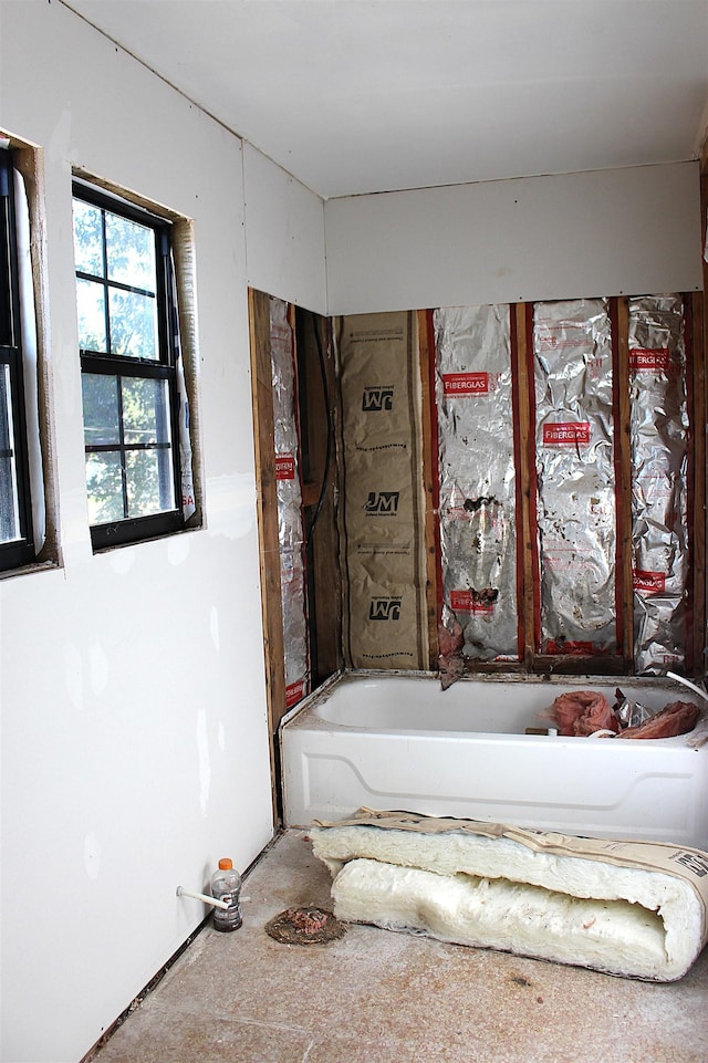 full bath with a tub to relax in