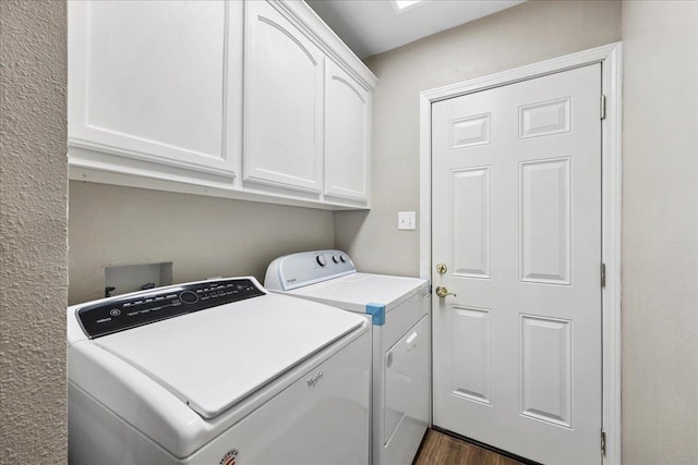 16 Briarcliff Ln, Lumberton, TX 77657 - laundry area featuring cabinet space, washing machine and dryer, and dark wood-style floors
