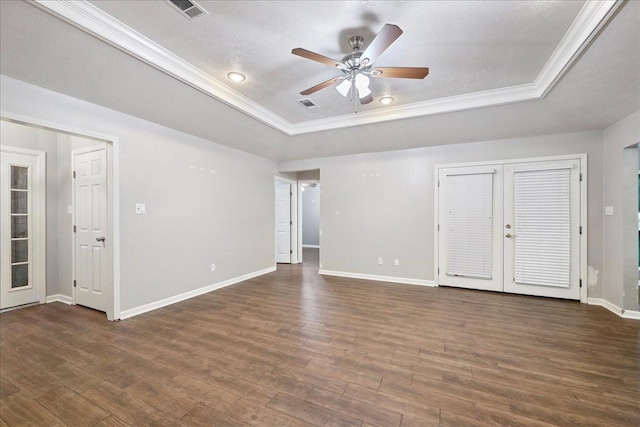 16 Briarcliff Ln, Lumberton, TX 77657 - empty room with a raised ceiling, french doors, ceiling fan, wood finished floors, and crown molding