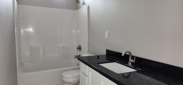 full bathroom featuring vanity, toilet, and shower / washtub combination