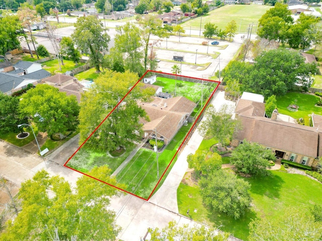aerial perspective of suburban area featuring property boundaries highlighted