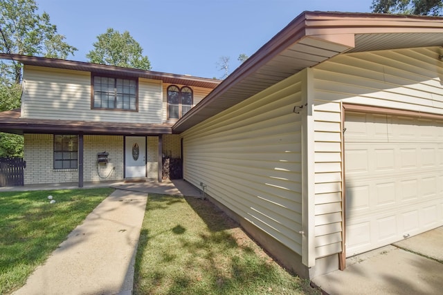 view of front of home with a porch and a front yard