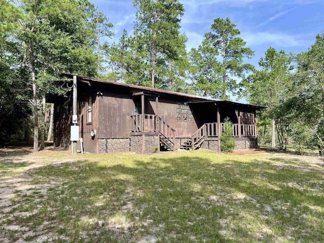 357 Hawks, Kountze, TX 77625 - view of front of home featuring a front yard