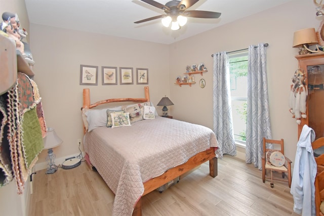 115 Pr 5250, Warren, TX 77664 - bedroom with light wood-style floors and a ceiling fan