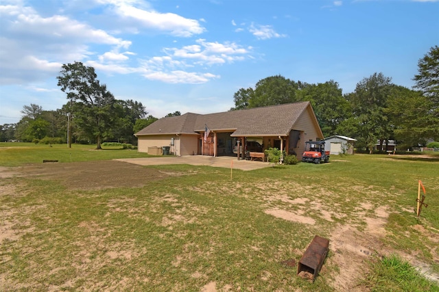 115 Pr 5250, Warren, TX 77664 - view of front facade with a front yard, driveway, and a patio area