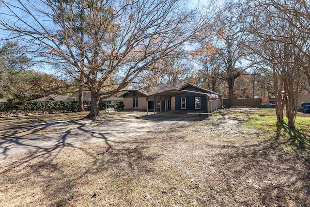 view of front of property with a carport