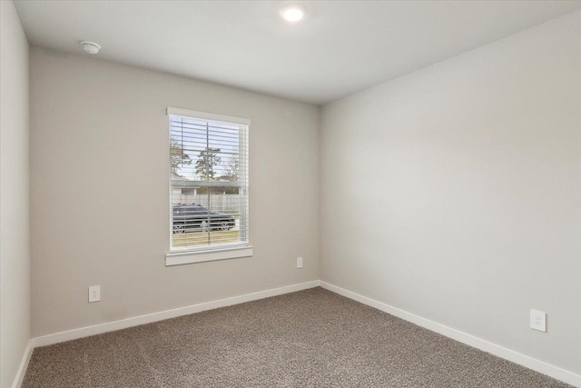 view of carpeted spare room