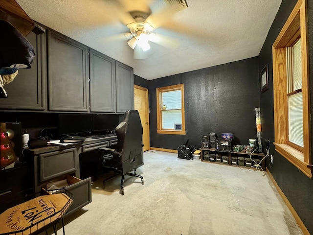200 Hazel Dr, Village Mills, TX 77663 - office area with ceiling fan, concrete floors, a textured ceiling, and baseboards