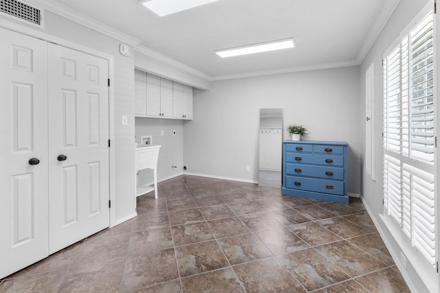 laundry area featuring cabinets, hookup for a washing machine, crown molding, and hookup for an electric dryer