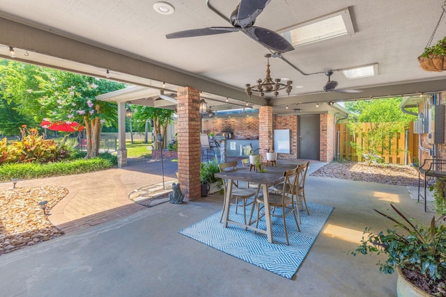 view of patio / terrace featuring ceiling fan