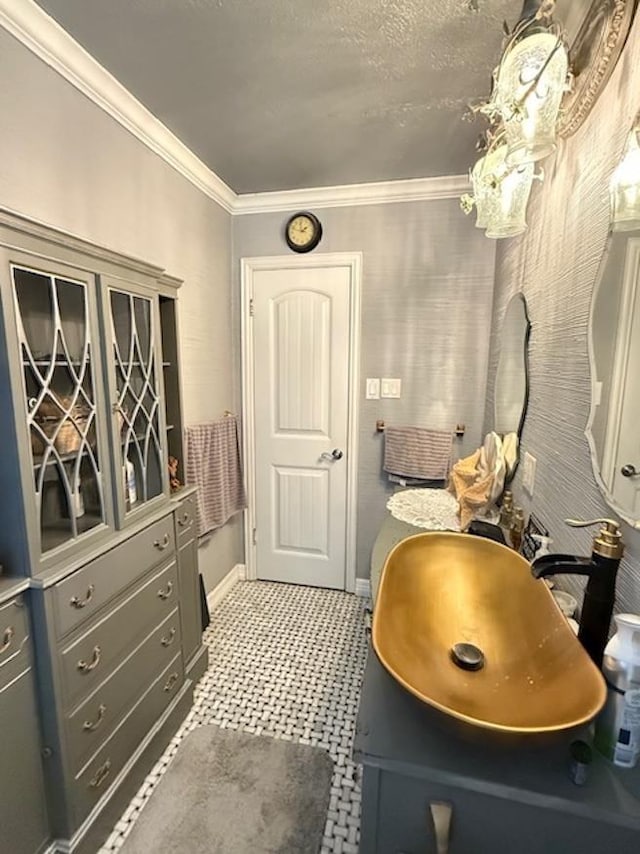 215 Wildwood Dr, Village Mills, TX 77663 - bathroom with crown molding, tile patterned floors, baseboards, and vanity