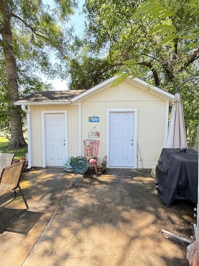 215 Wildwood Dr, Village Mills, TX 77663 - view of outbuilding featuring an outbuilding