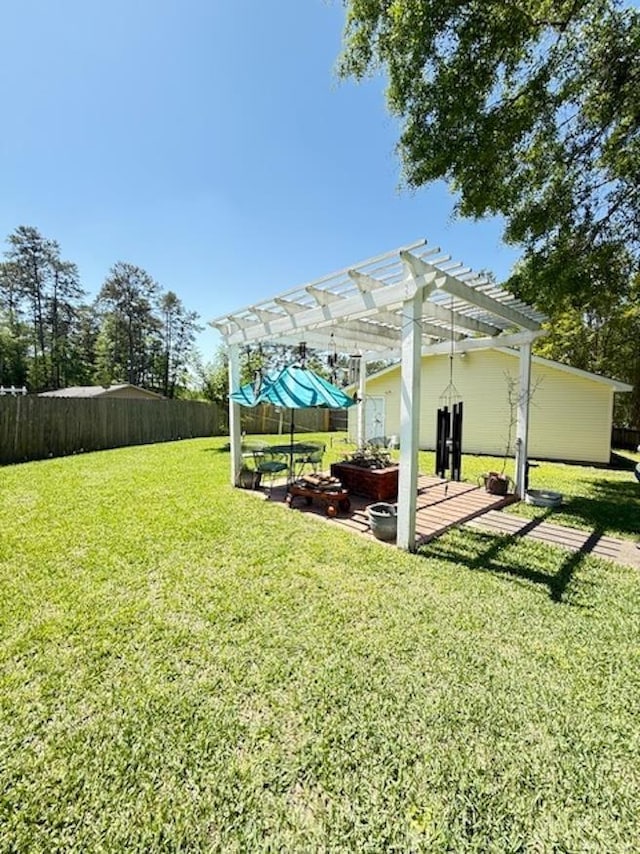 215 Wildwood Dr, Village Mills, TX 77663 - view of yard featuring a pergola and fence