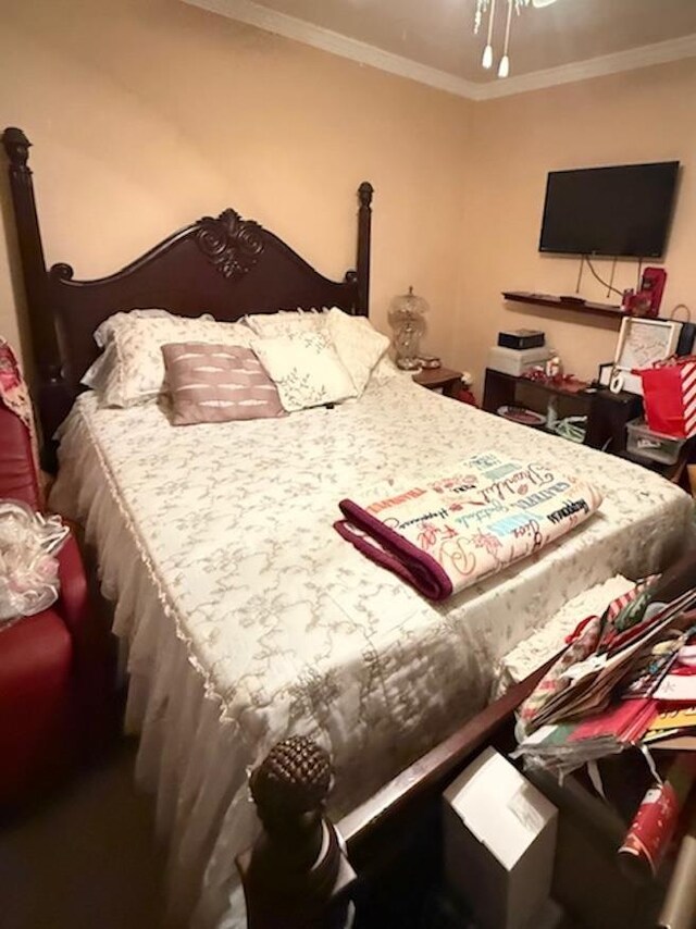 215 Wildwood Dr, Village Mills, TX 77663 - bedroom featuring crown molding