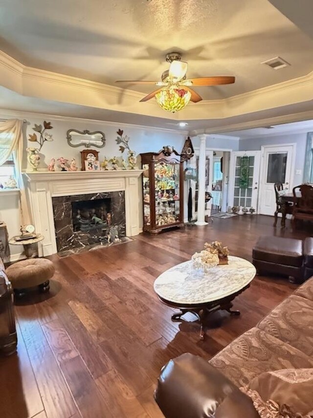 215 Wildwood Dr, Village Mills, TX 77663 - living area featuring visible vents, a tray ceiling, and ornamental molding