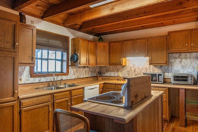 kitchen featuring white dishwasher, beamed ceiling, sink, dark hardwood / wood-style floors, and butcher block countertops