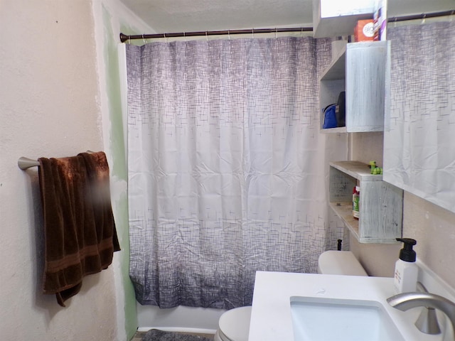 6162 E Dr, Groves, TX 77619 - full bath with toilet and shower / tub combo