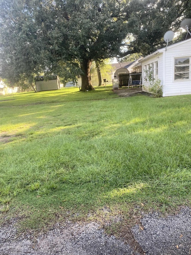 view of yard featuring a carport