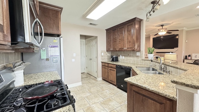 kitchen featuring stainless steel range with gas cooktop, tasteful backsplash, visible vents, a sink, and dishwasher