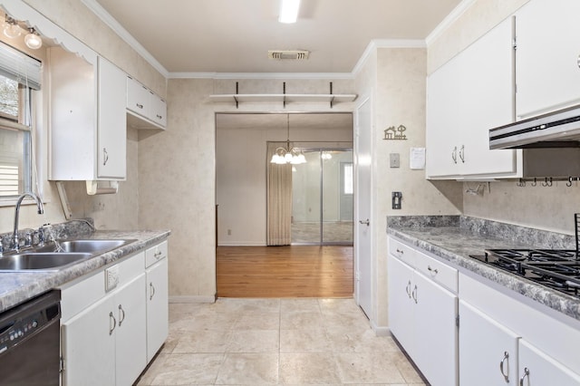 kitchen featuring black appliances, a sink, white cabinets, crown molding, and baseboards