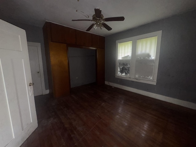 2726 13th St, Port Arthur, TX 77640 - unfurnished bedroom with dark wood finished floors, a closet, and ceiling fan