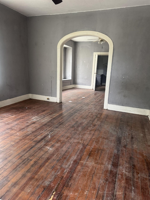 2726 13th St, Port Arthur, TX 77640 - spare room featuring hardwood / wood-style floors, a ceiling fan, and arched walkways