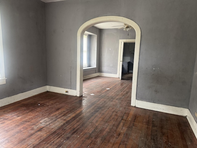 2726 13th St, Port Arthur, TX 77640 - spare room featuring hardwood / wood-style floors, arched walkways, and ceiling fan